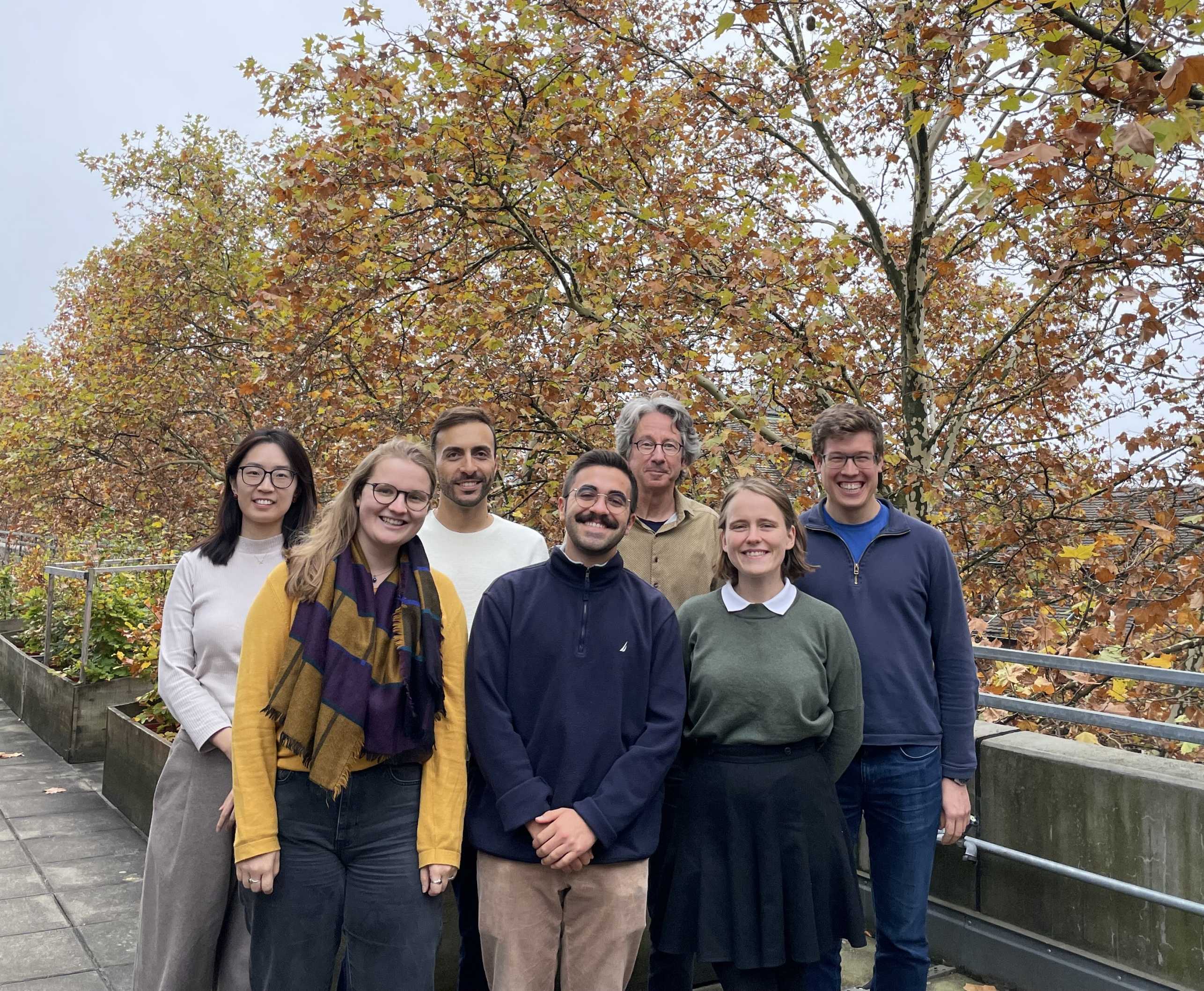 A photo of the curret IAC Travel Transformation Taskforce members, on the CHN terrasse.